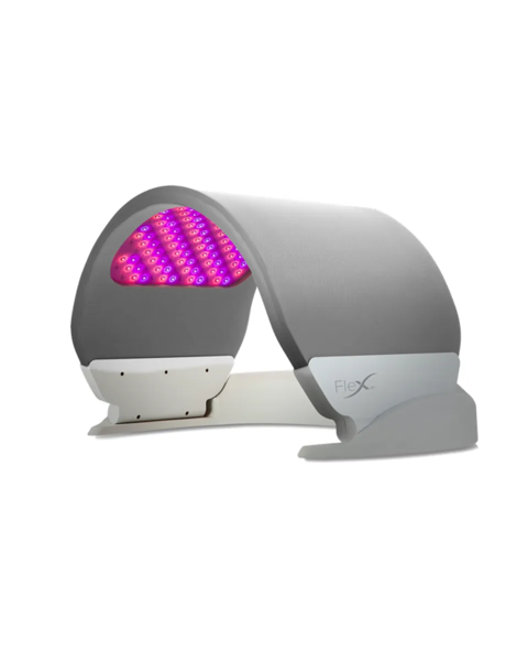 A sleek, professional FlexMD™ LED Light Therapy device set up at BioRevive Calgary. The flexible, curved LED panel emits a gentle red and near-infrared glow. The scene conveys advanced, clinical-grade skin rejuvenation technology in a calm, restorative environment — highlighting BioRevive’s expertise in LED light therapy in Calgary.