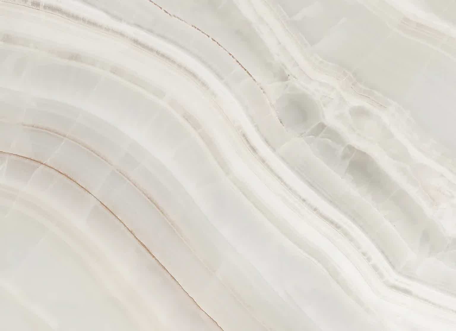 Abstract white marble texture with subtle veins and wavy patterns.