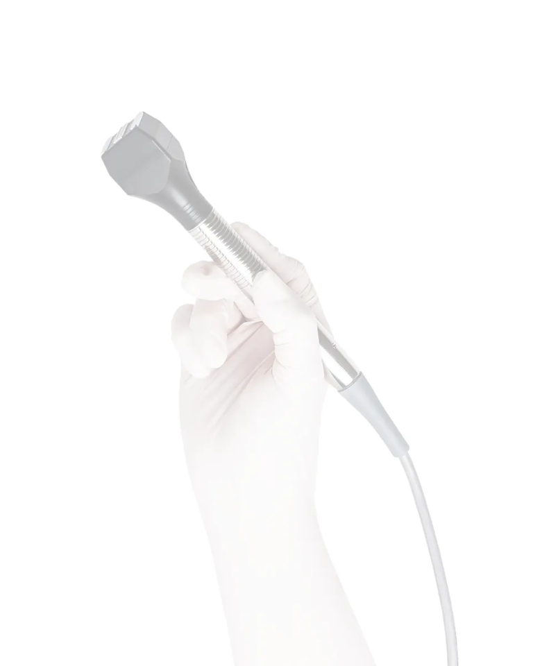Hand holding a Forma radiofrequency skin tightening device used at Biorevive clinic in Calgary.