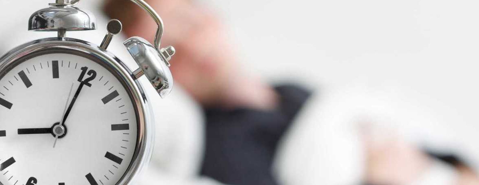 Restful bedroom setting representing healthy sleep and circadian rhythm