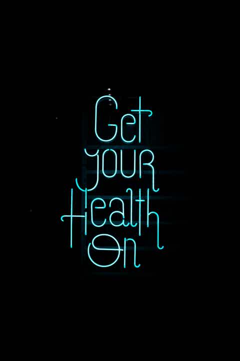 a neon sign that says get your health on