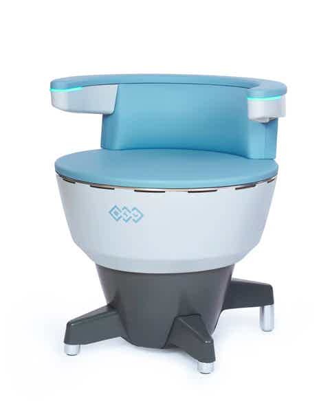 A calm, confident woman sits comfortably on an advanced Emsella™ chair in a bright, spa-like treatment room. The setting feels modern, discreet, and medical yet welcoming—reflecting empowerment, comfort, and renewed confidence.