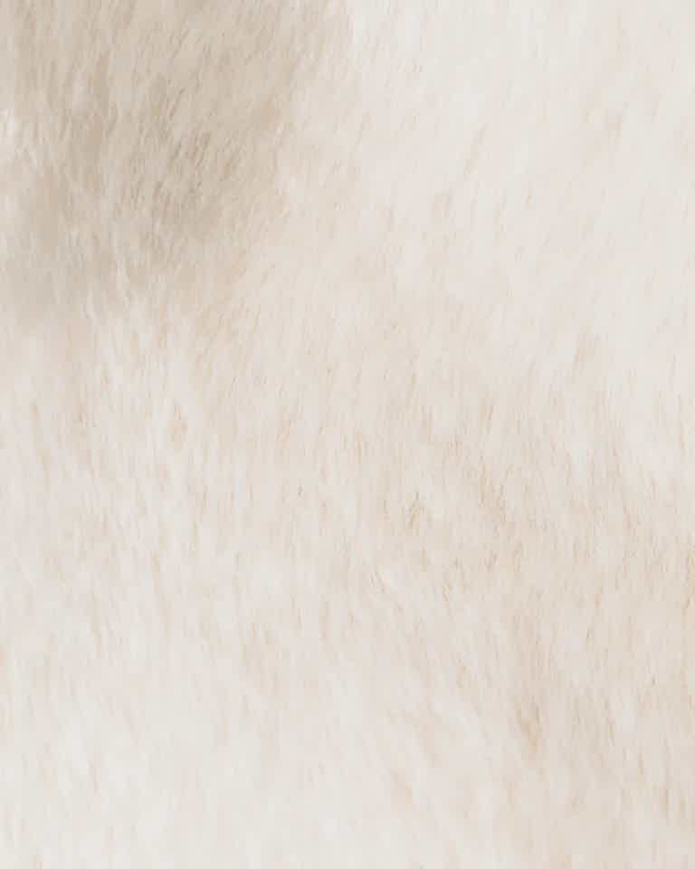 Close-up of a fair-skinned woman’s cheek with dullness and texture at BioRevive Calgary clinic.