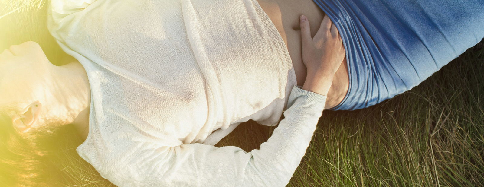 a person lying in a blanket