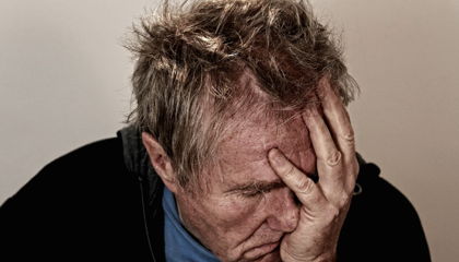 A person experiencing chronic fatigue as a result of being burnt out.