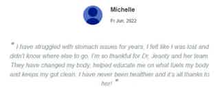 Testimonial quote about improved health: patient credits Dr. Jeanty and her team for better digestion and wellbeing.